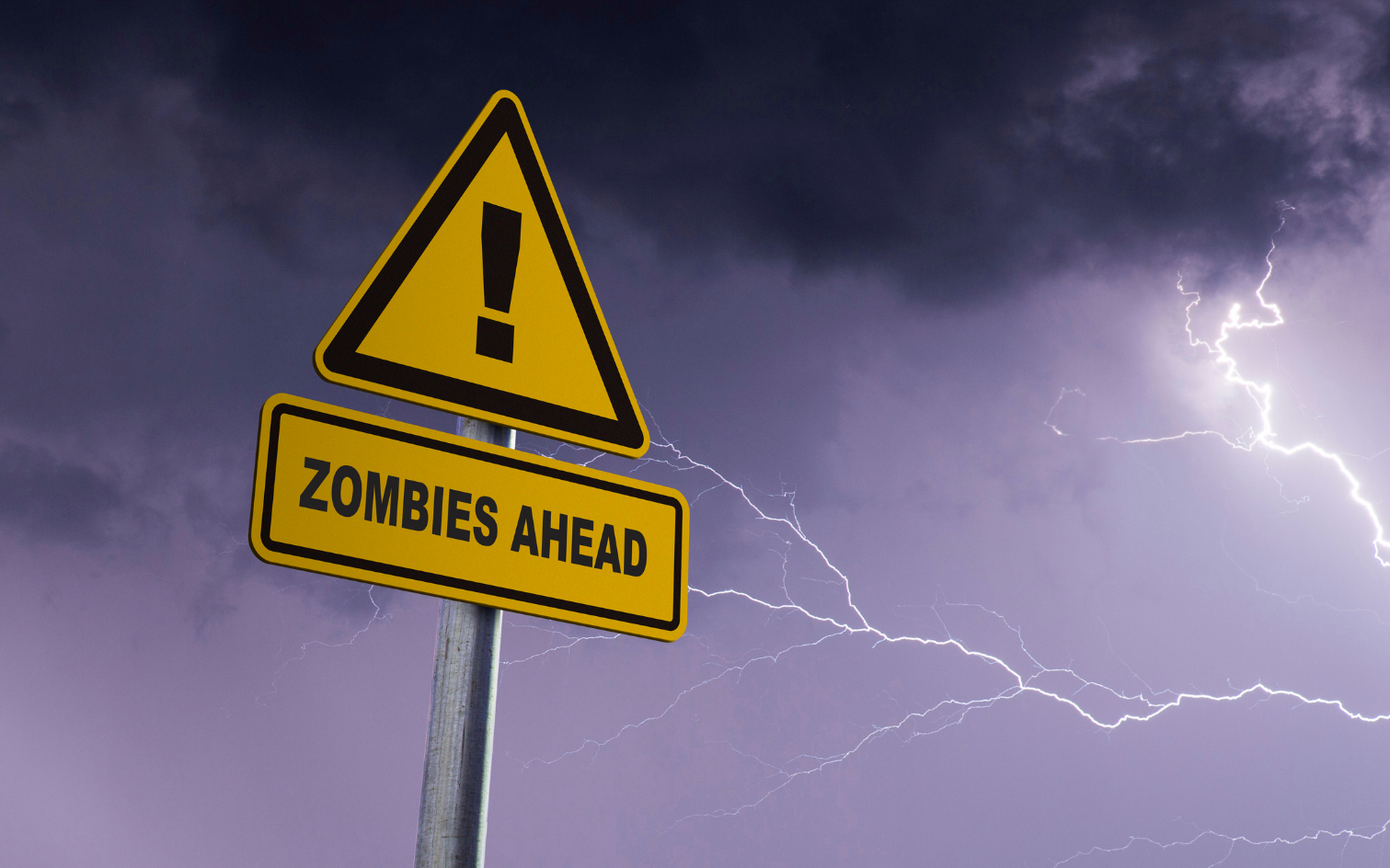 a yellow sign with a warning sign in front of a lightning bolt
