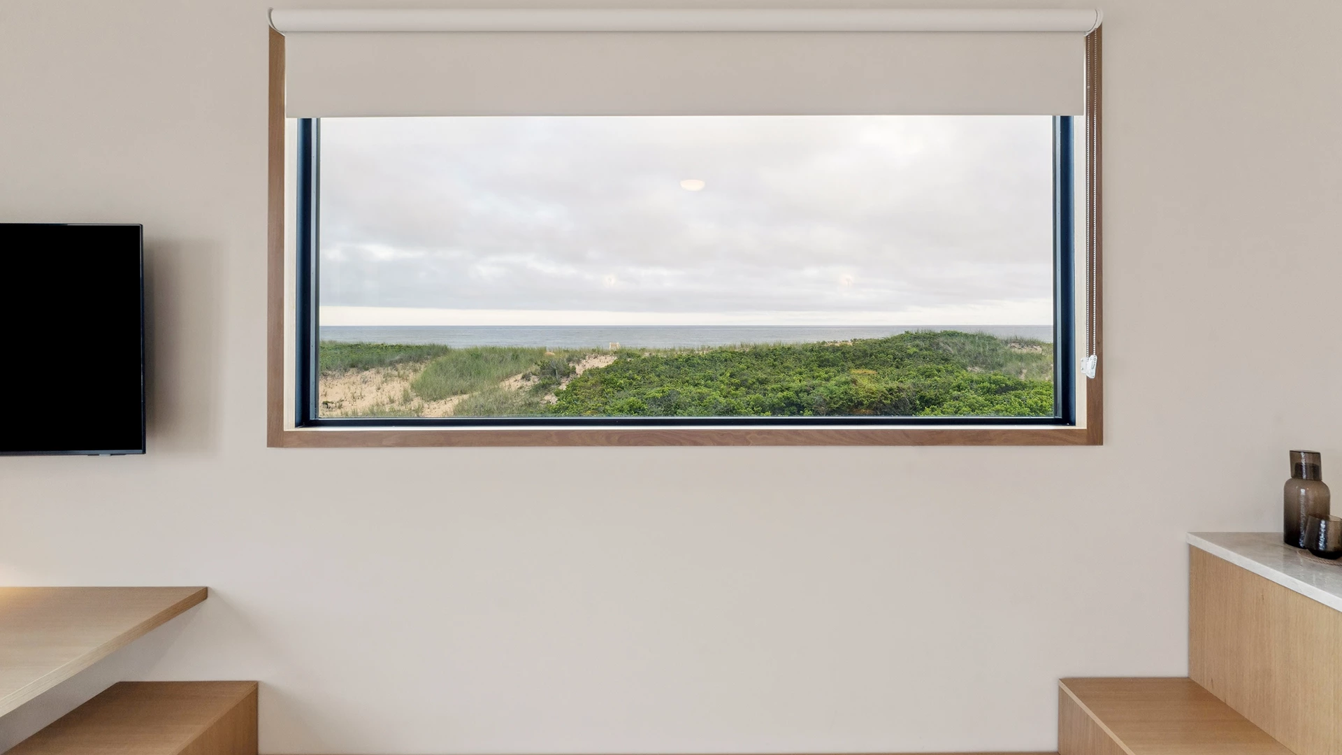 a window with a view of the ocean