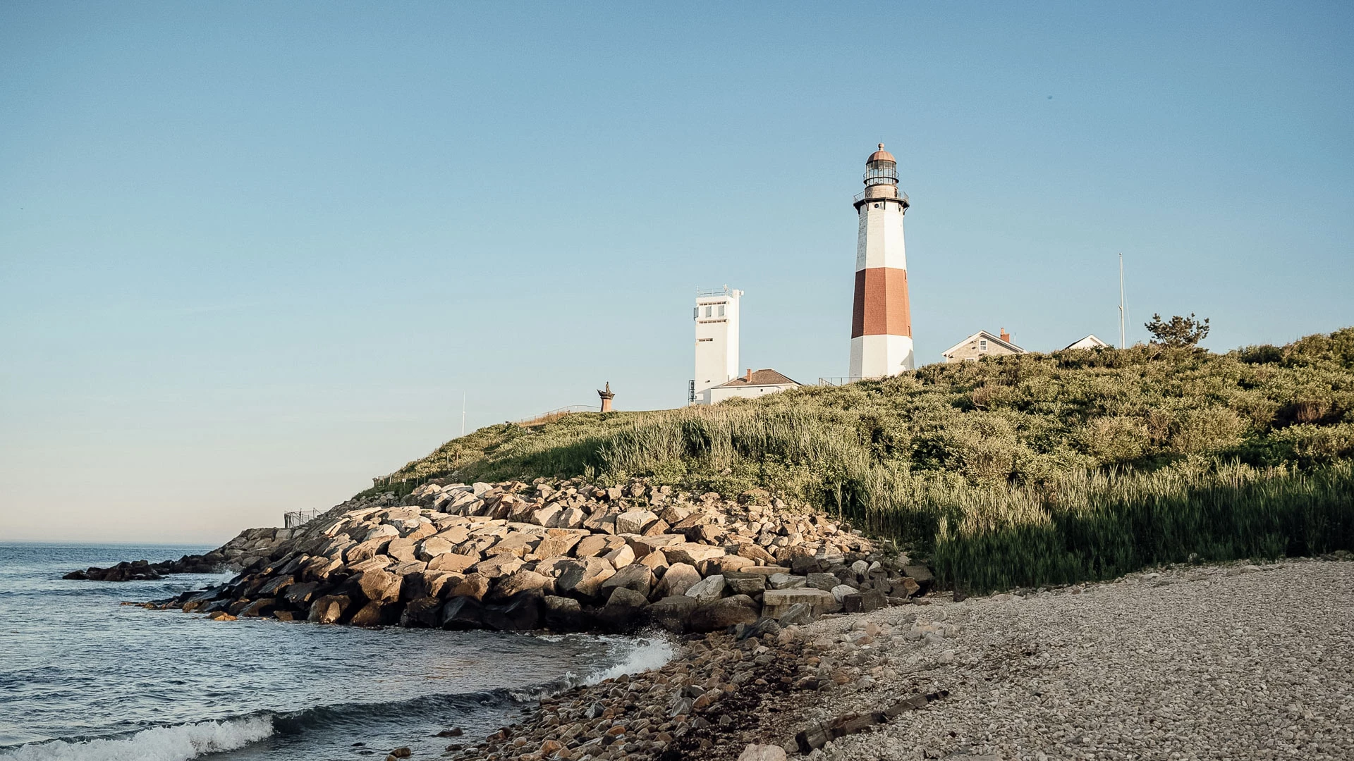 a lighthouse on a hill