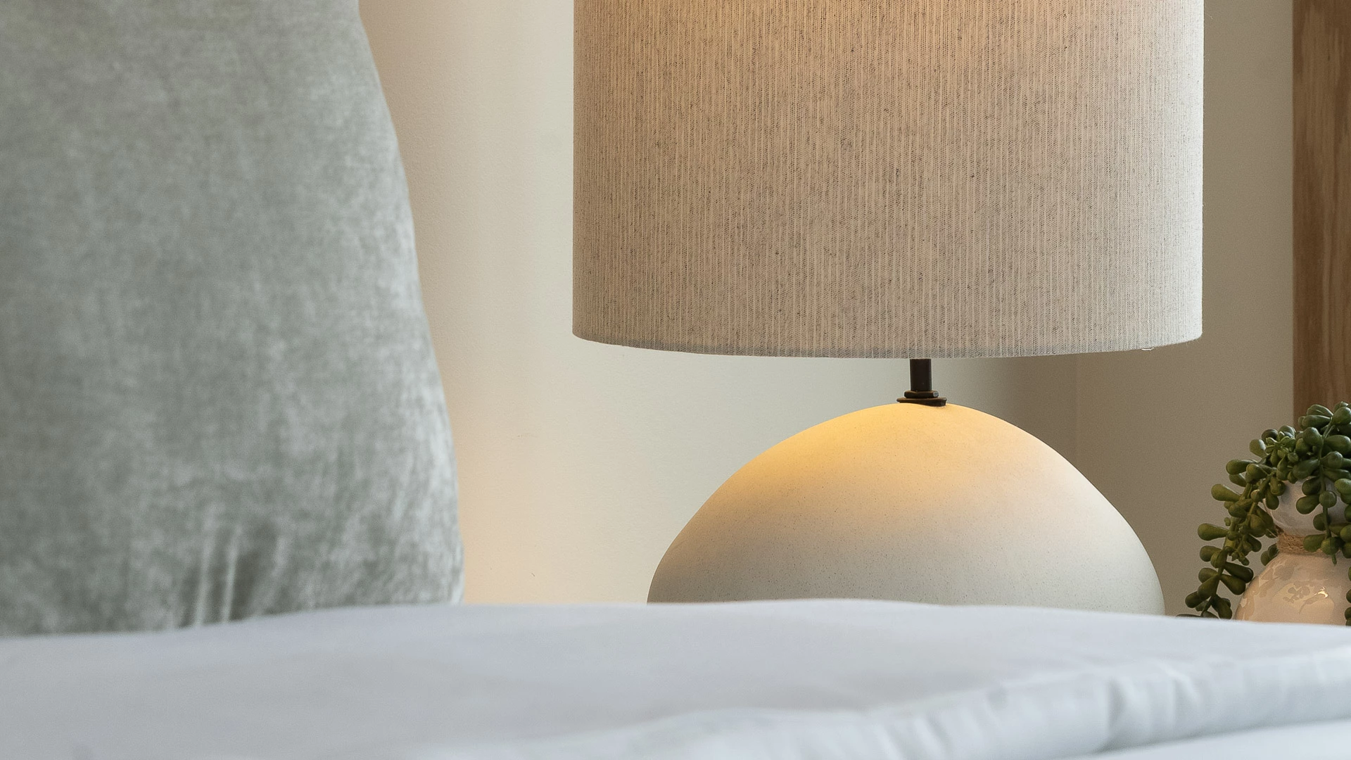 a lamp on a bed