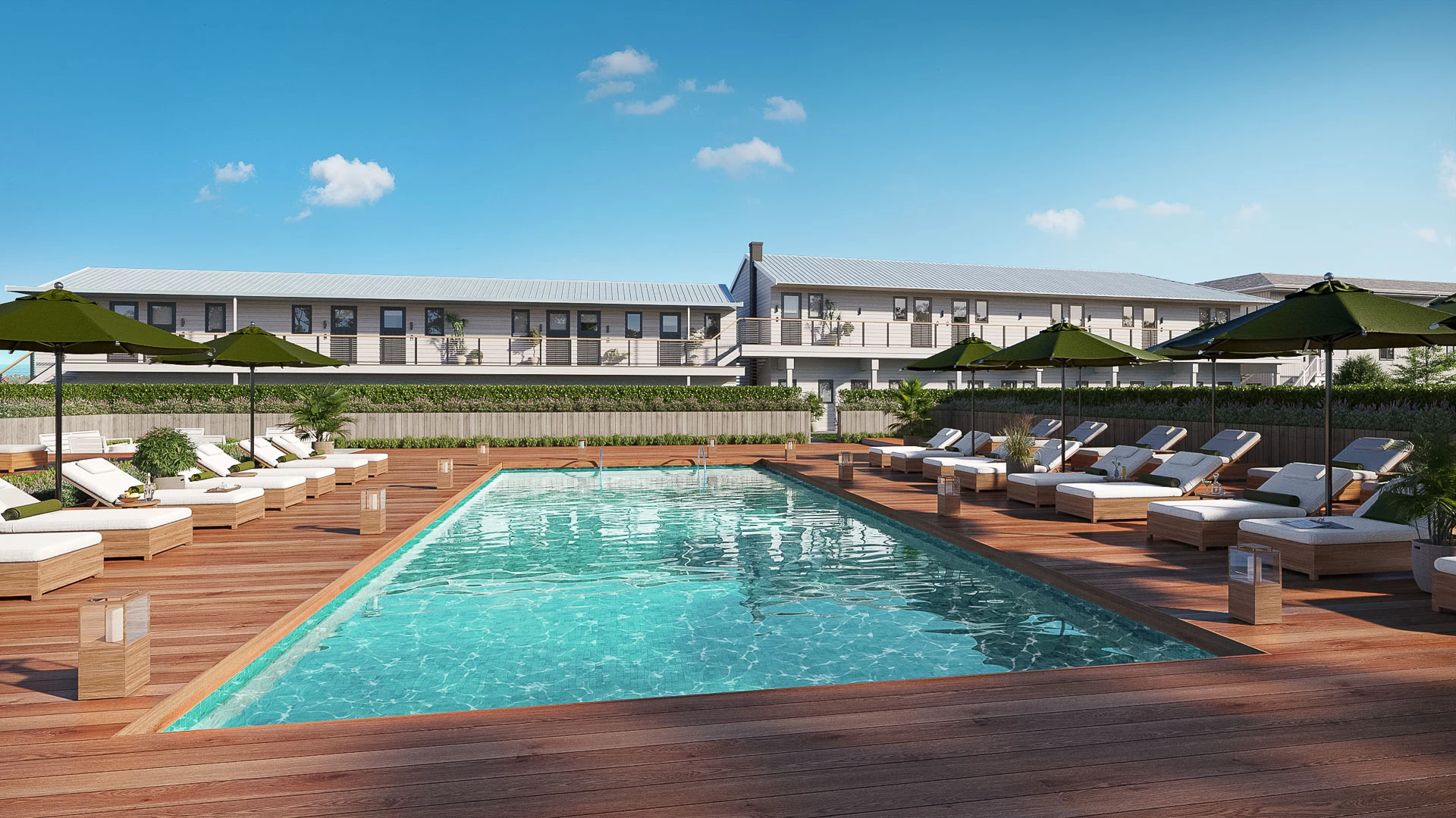 a pool with lounge chairs and umbrellas