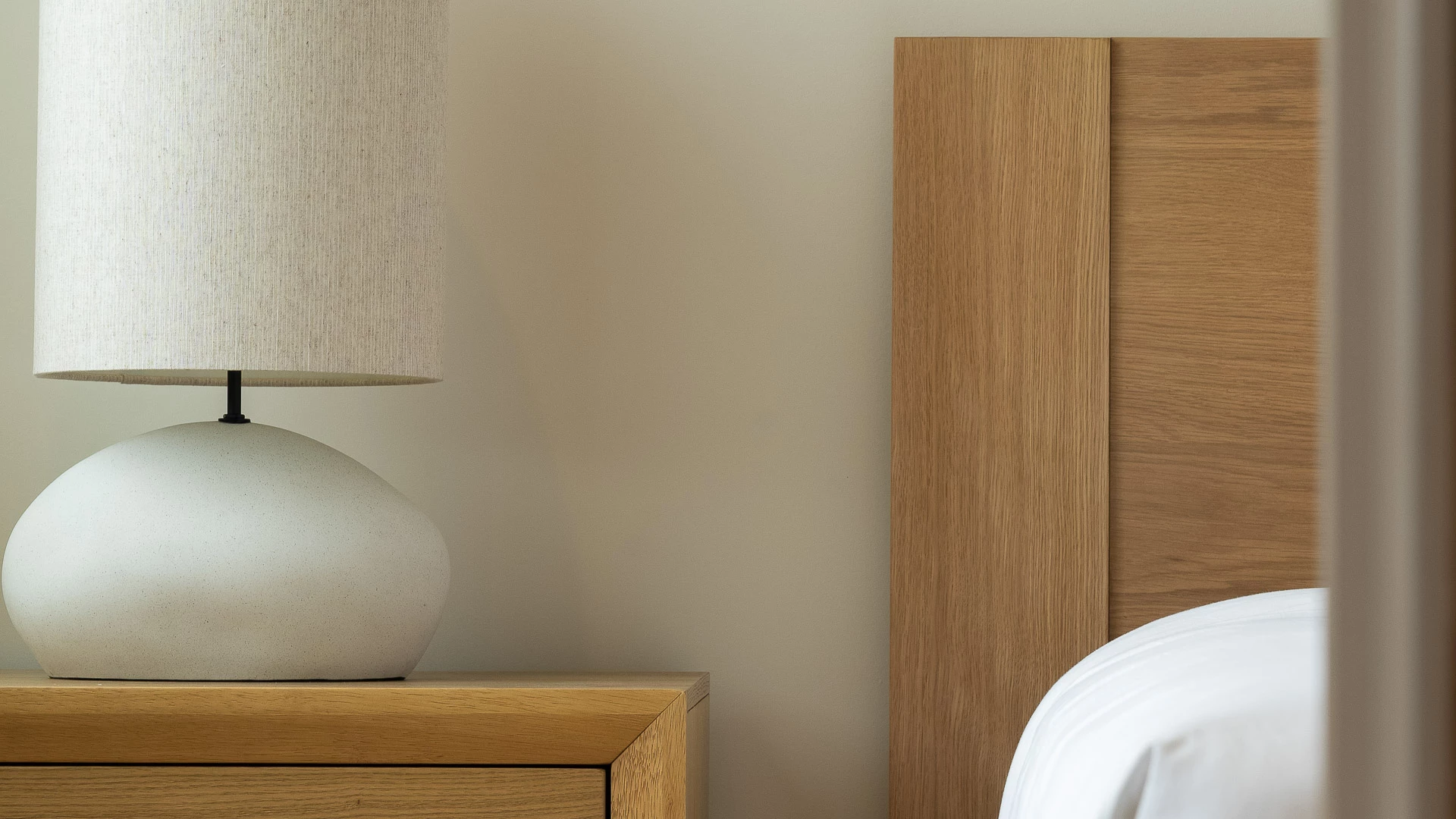 a lamp on a nightstand