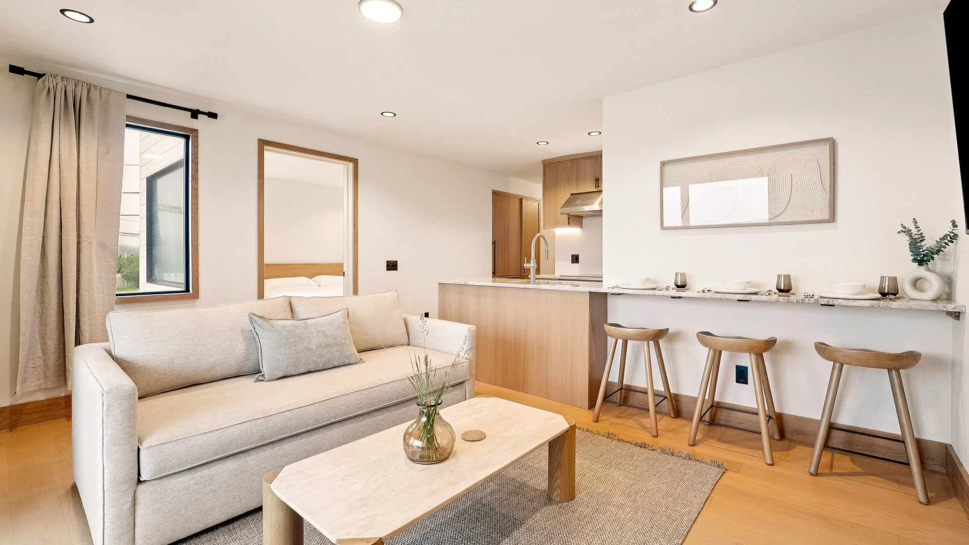 a living room with a couch and a table