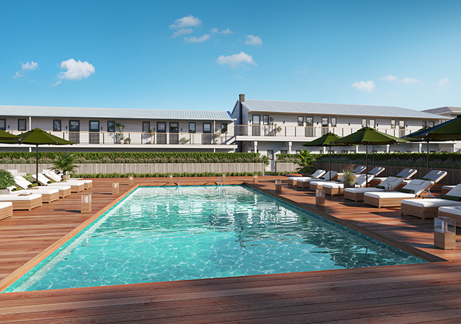 a pool with chairs and umbrellas in front of a building