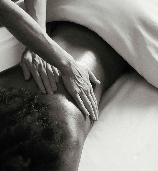 a person receiving a back massage