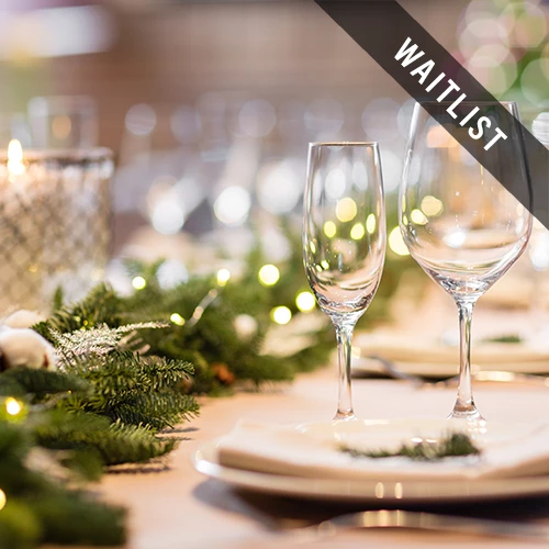a table with a couple of wine glasses