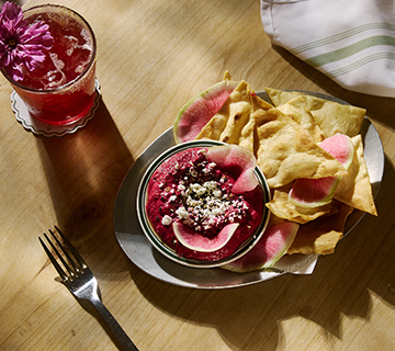 a plate of food and a drink