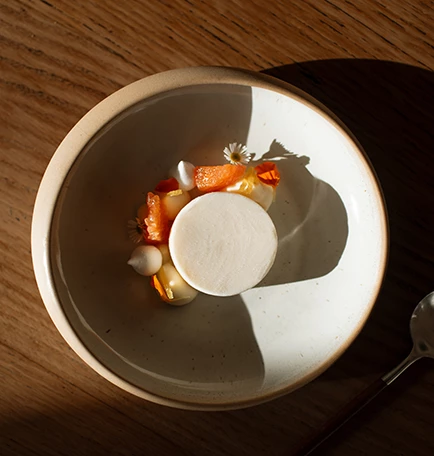 a bowl of food with a spoon