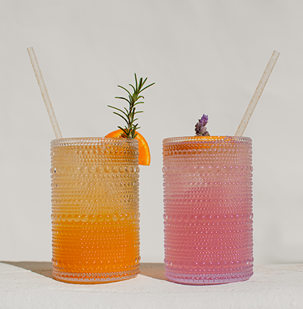 two glasses with liquid in them