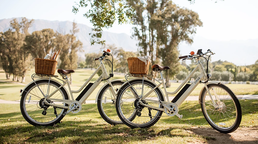 a group of bicycles with a basket on the back