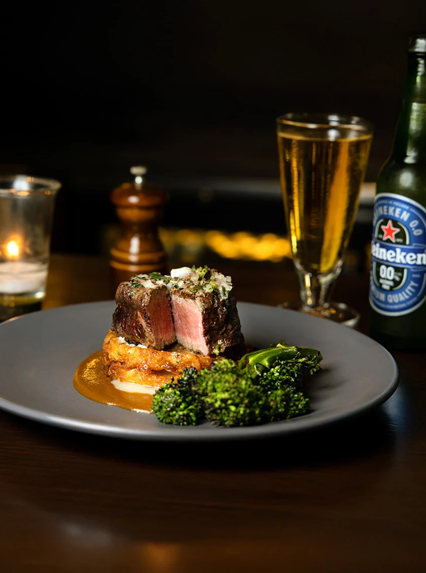 a plate of food and beer