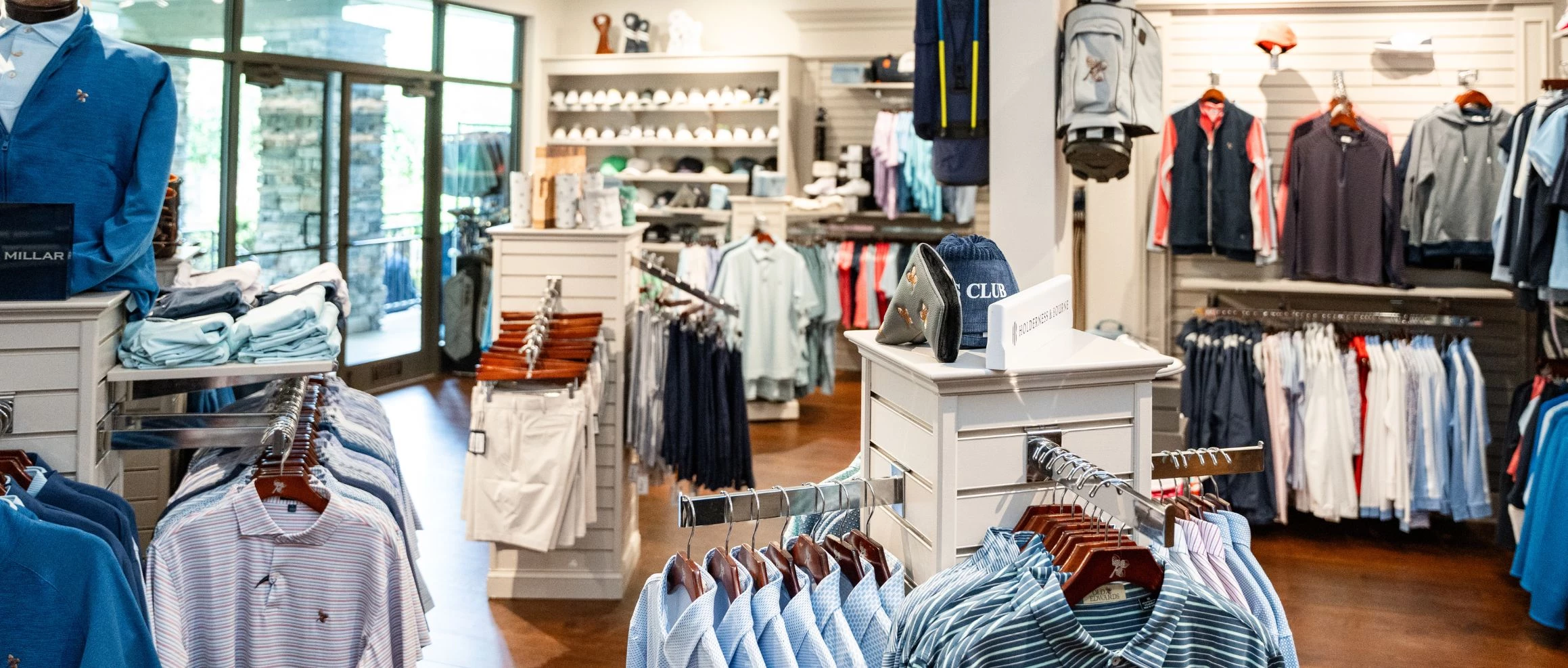 a clothing store with shelves and shelves