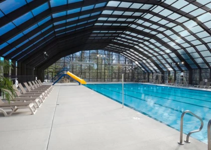 a swimming pool with a slide