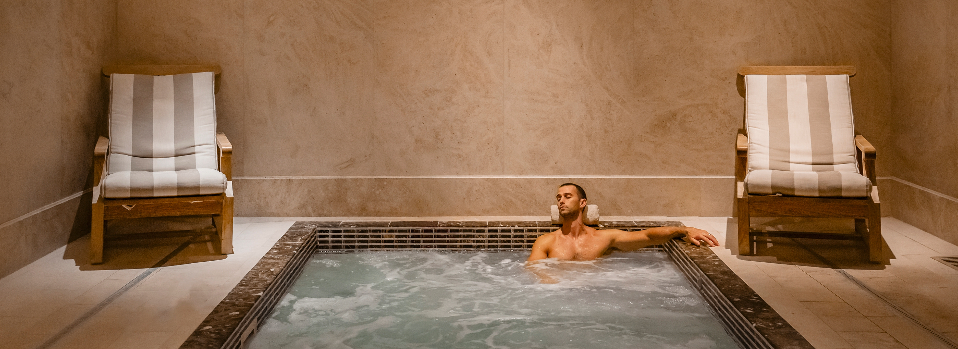 a man in a hot tub