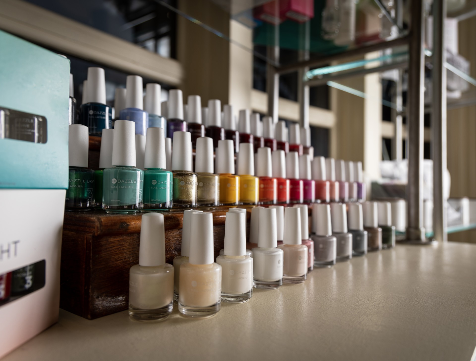 a group of bottles of nail polish