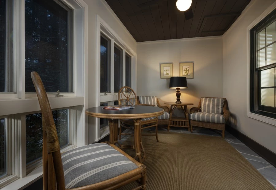 a room with a table and chairs