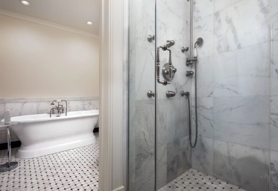 a shower with a bathtub and a tub