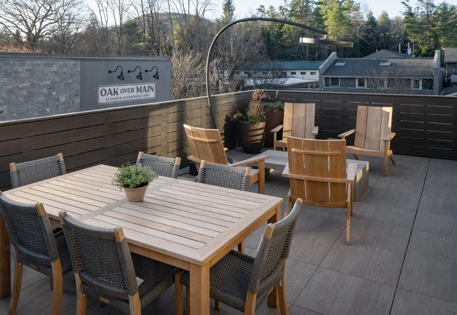 a table and chairs on a deck