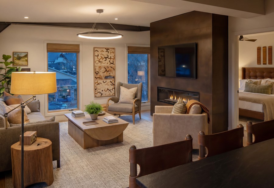 a living room with a fireplace and a couch