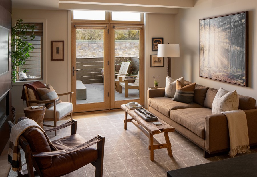 a living room with a couch and a table