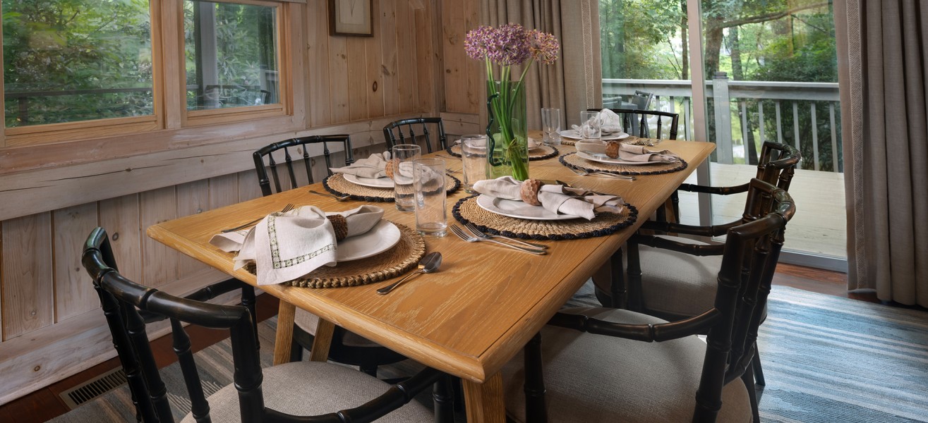 a table with plates and napkins on it