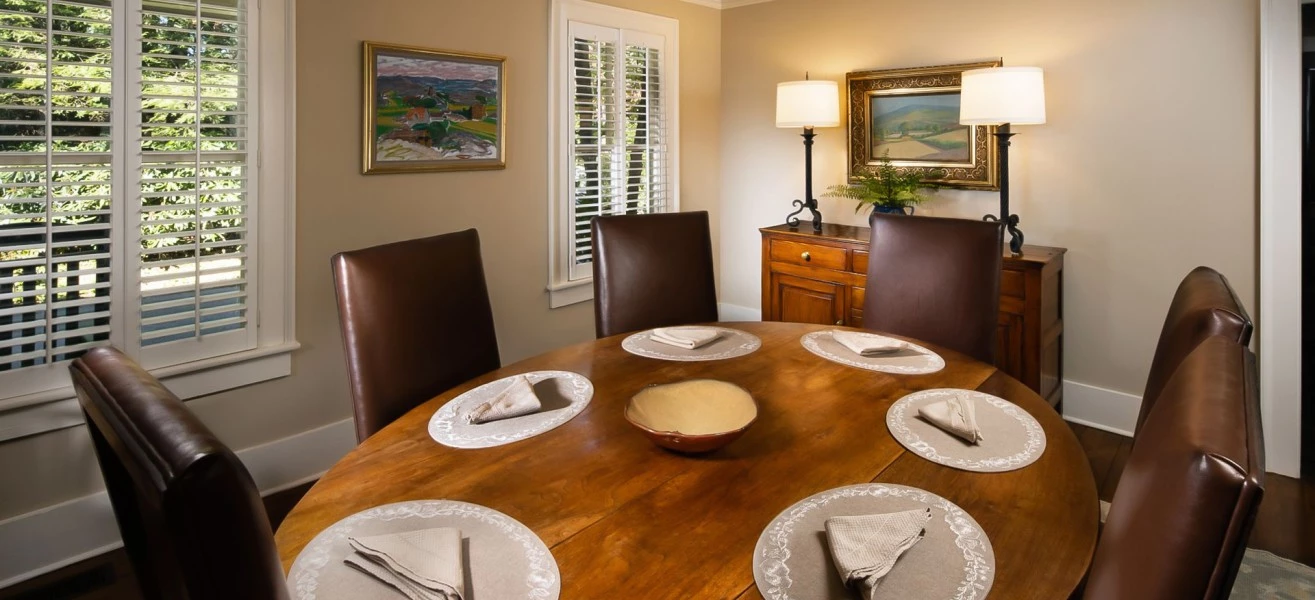 a table with plates and napkins in a room