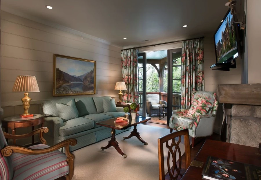 a living room with a television and a couch