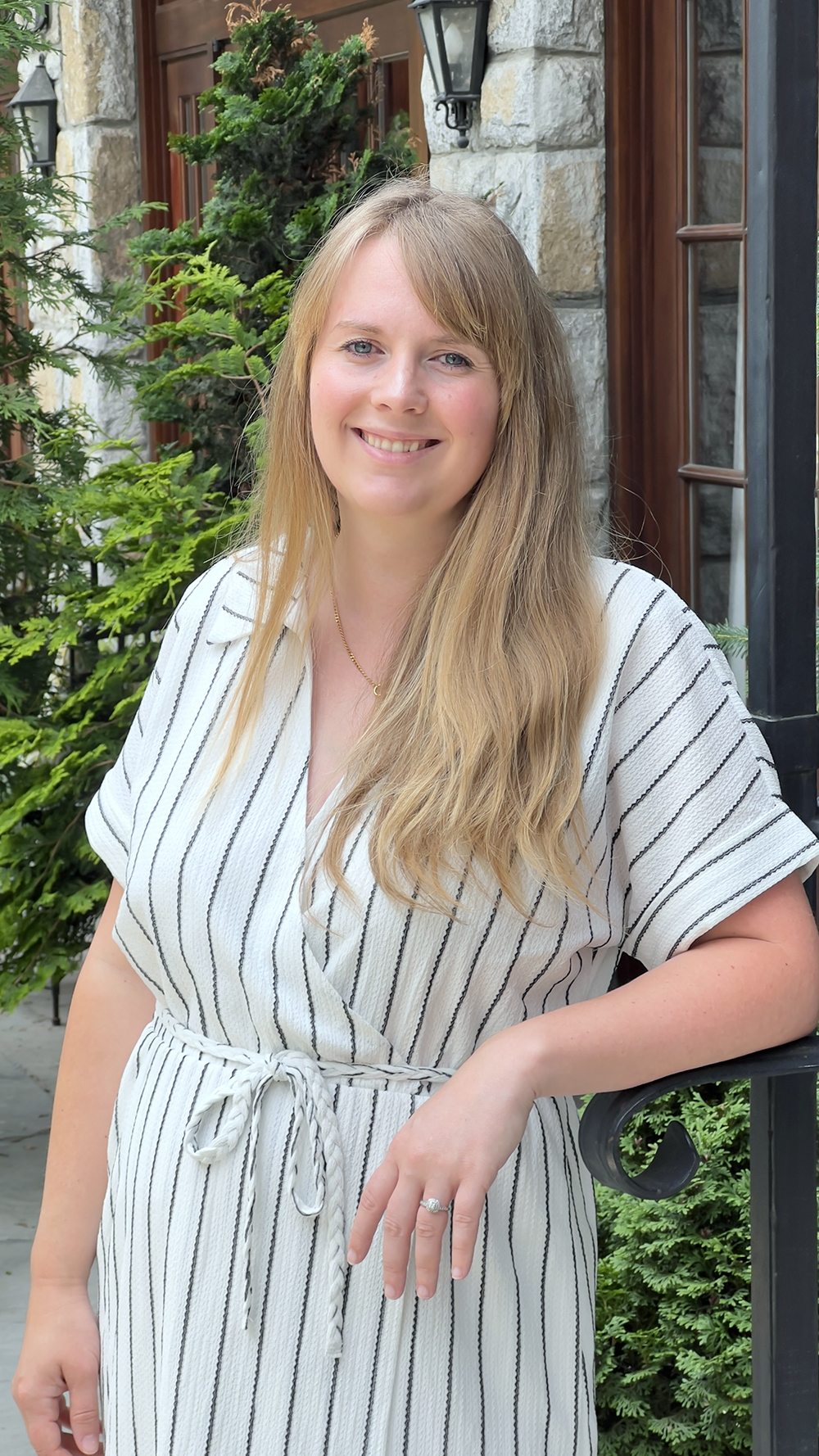 a woman smiling at camera