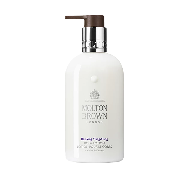 a white bottle with a brown lid