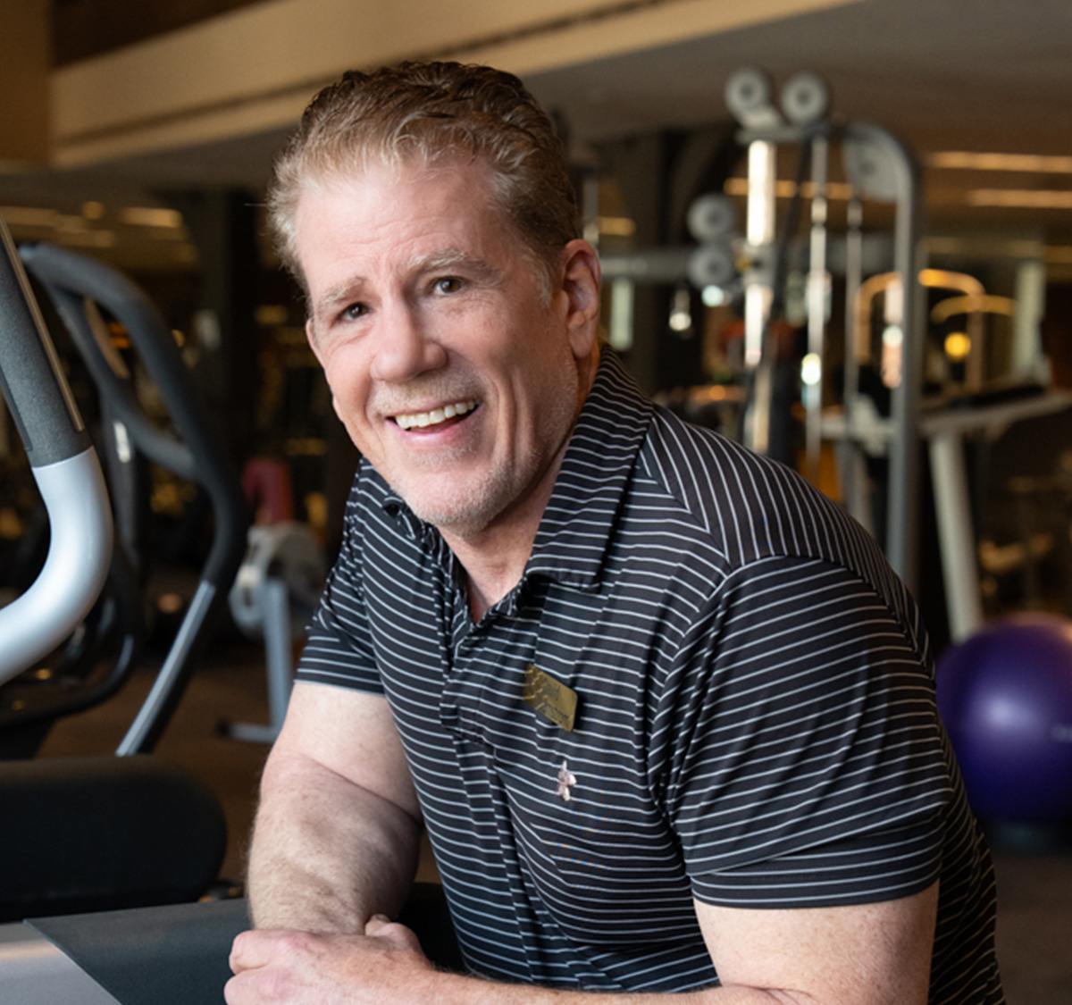 a man smiling at camera