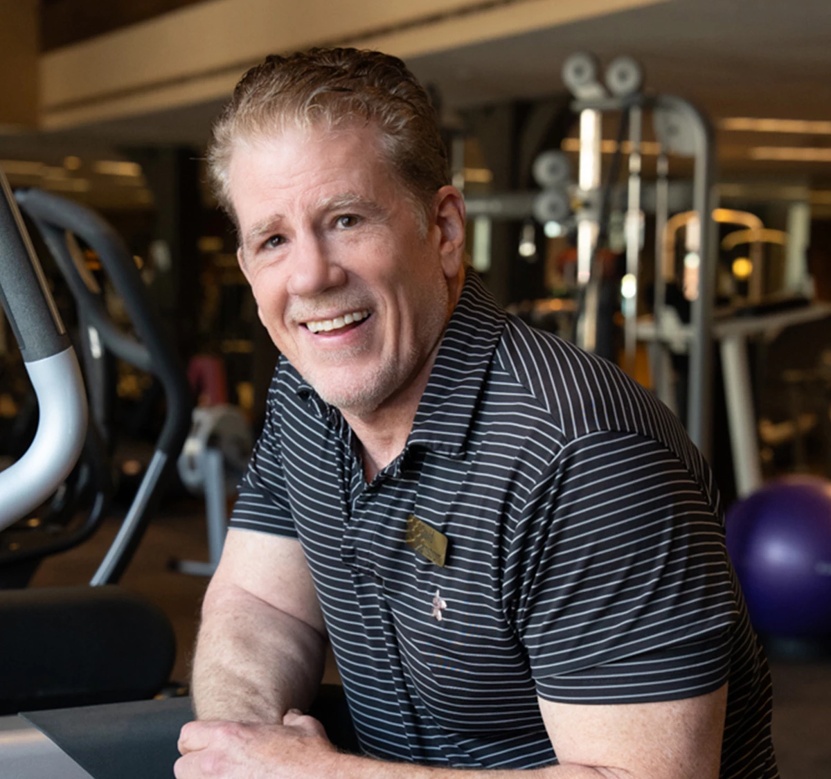 a man smiling at camera