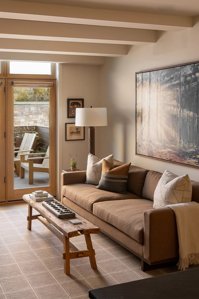 a living room with a couch and a table