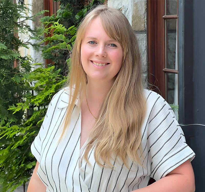 a woman smiling at camera