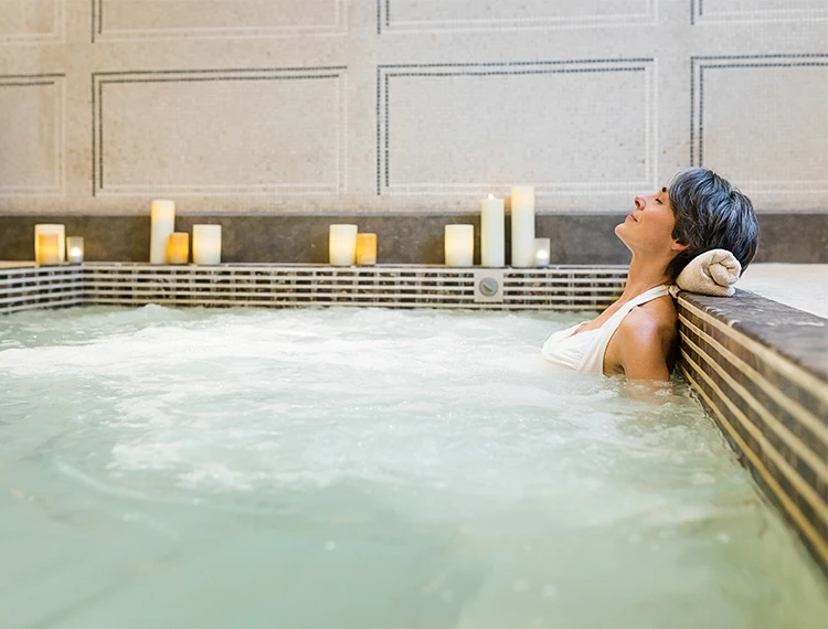 a woman in a hot tub