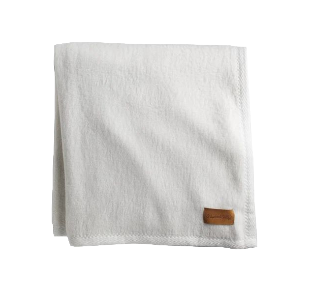 a white towel with a brown label