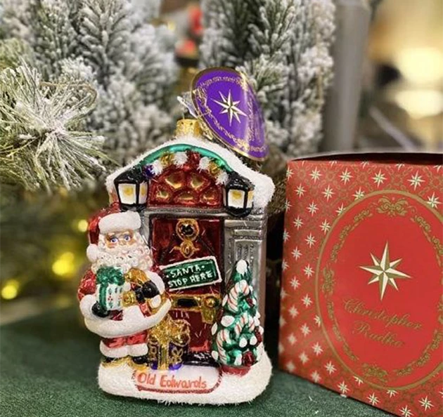 a christmas ornament next to a box
