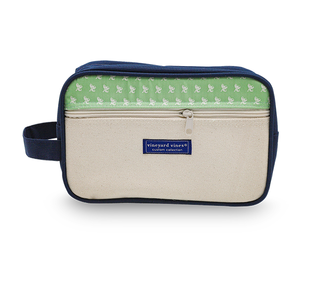 a small bag with a green and white fabric