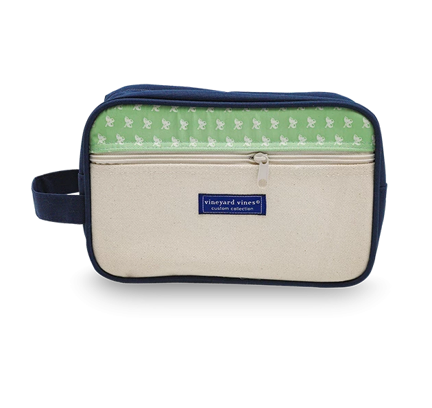 a small bag with a green and white fabric