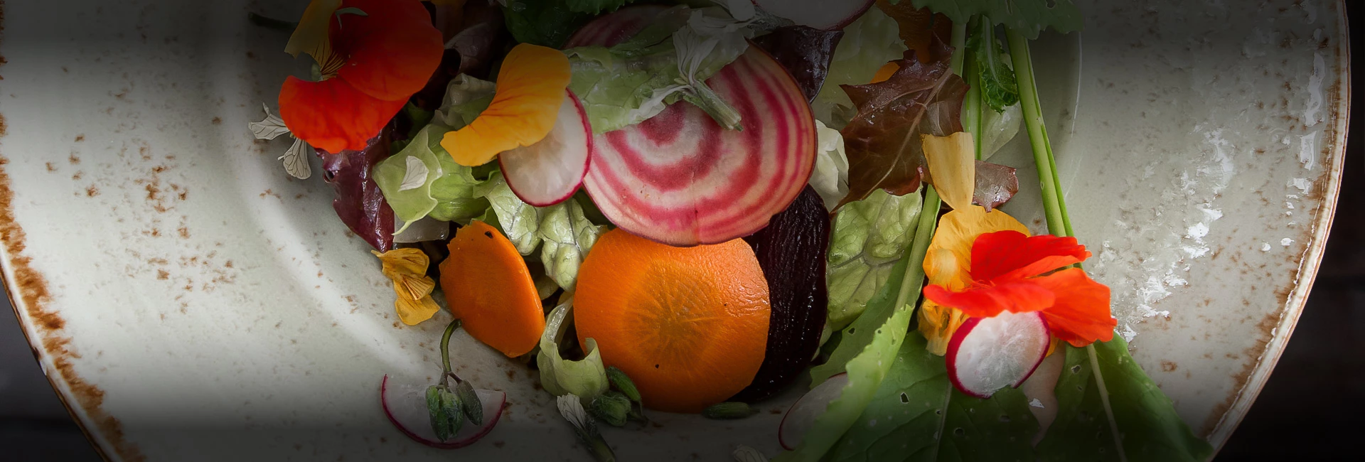 a salad with vegetables and fruits