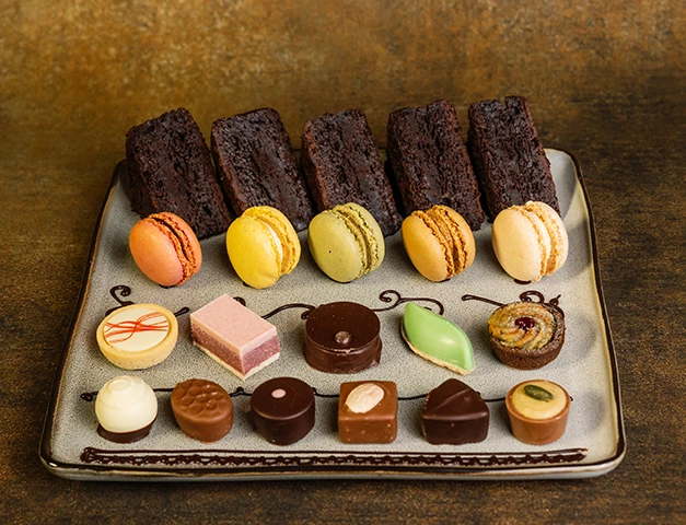 a plate of chocolate candies
