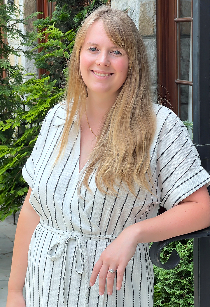a woman smiling at camera
