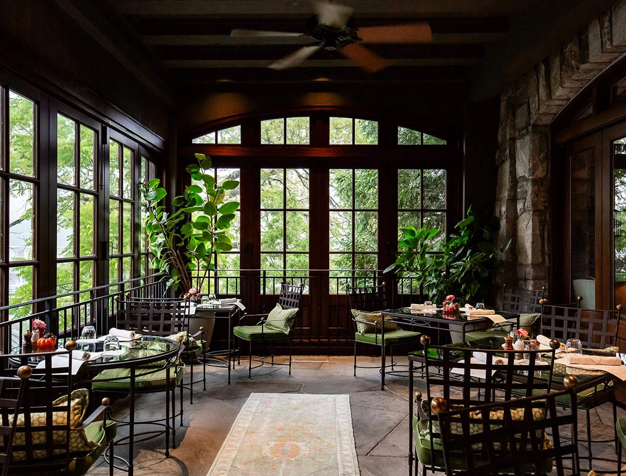 a room with tables and chairs