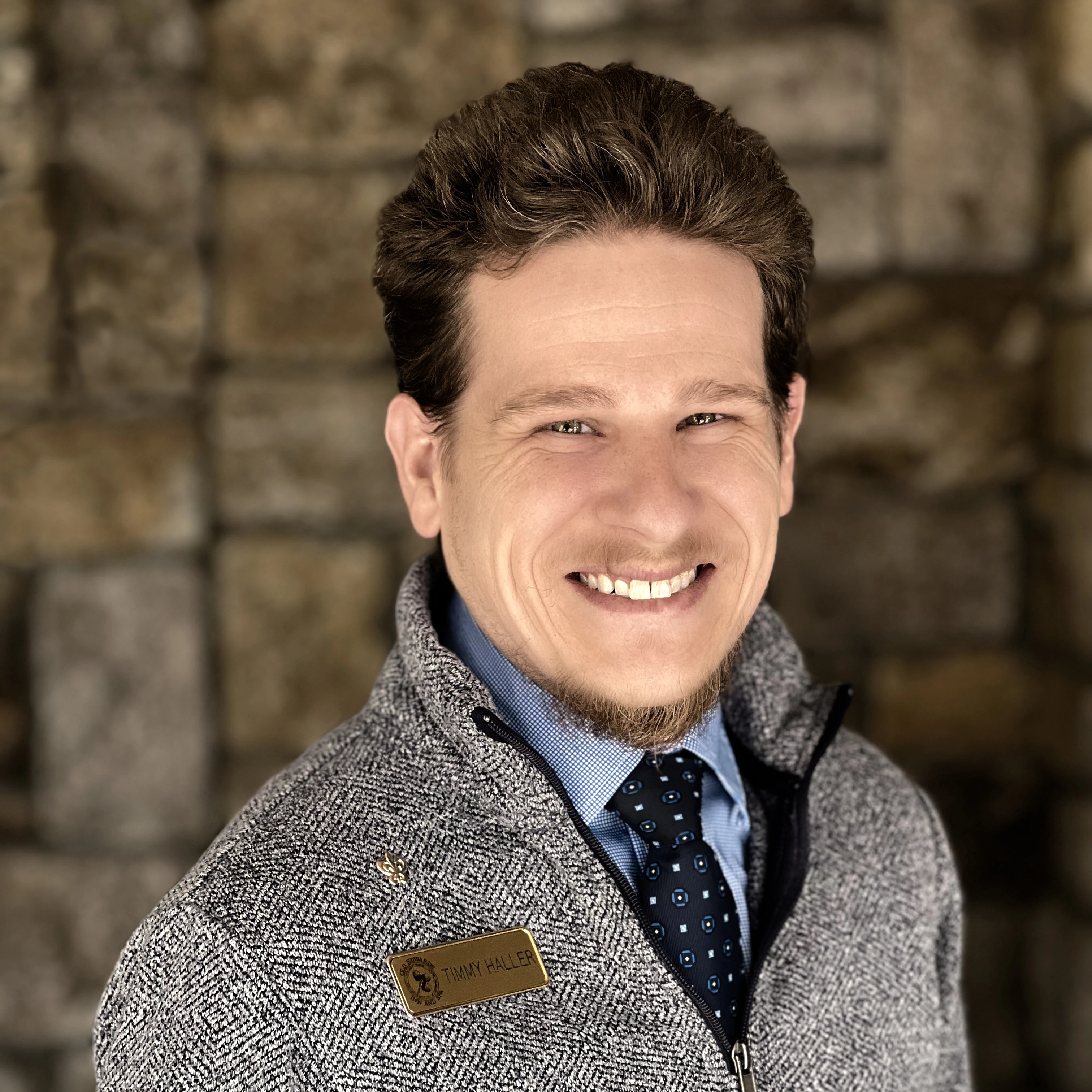 a man smiling at camera