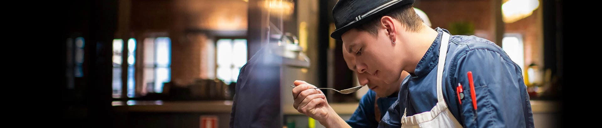 Staff members working in the kitchen