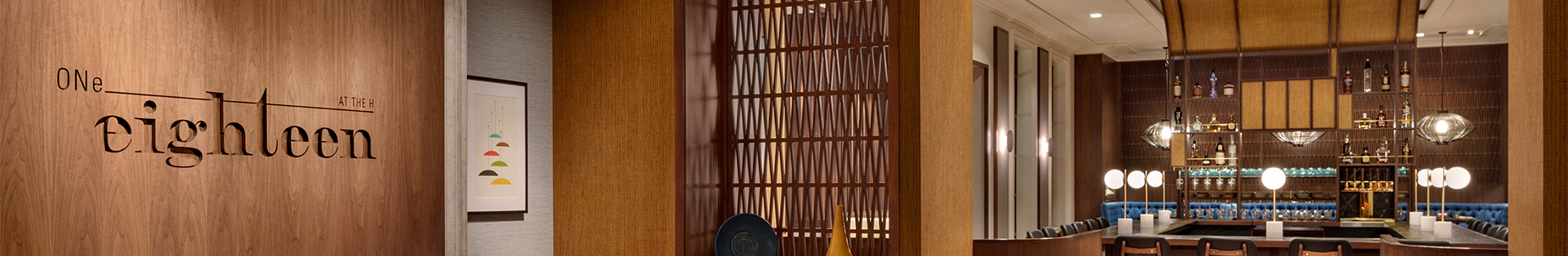a vase and a plate on a shelf