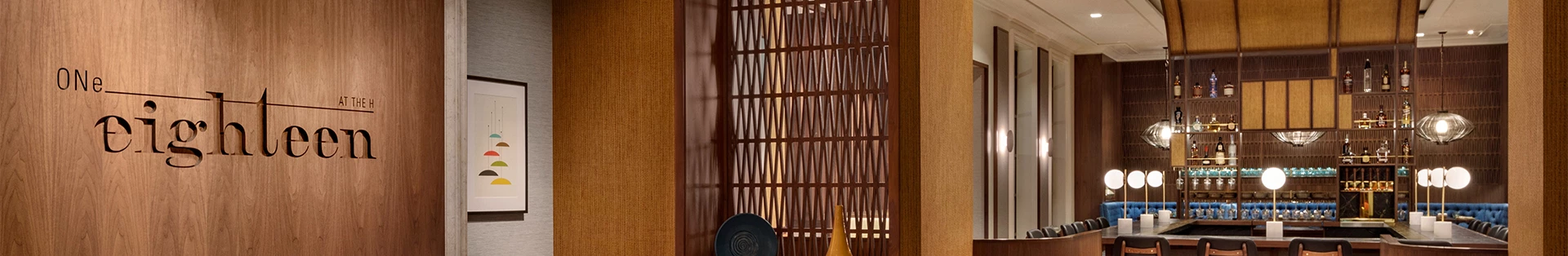 a vase and a plate on a shelf