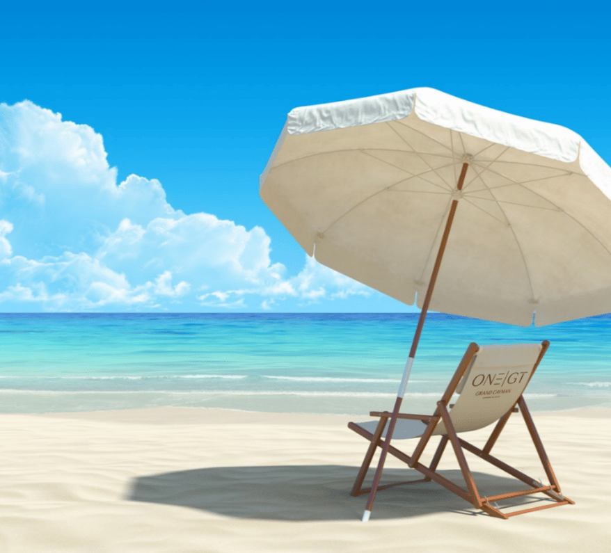 a beach chair and umbrella on a sandy beach