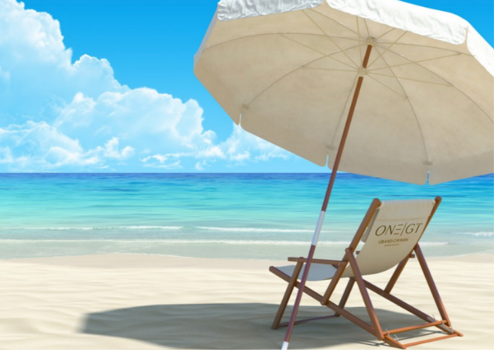 a beach chair and umbrella on a beach