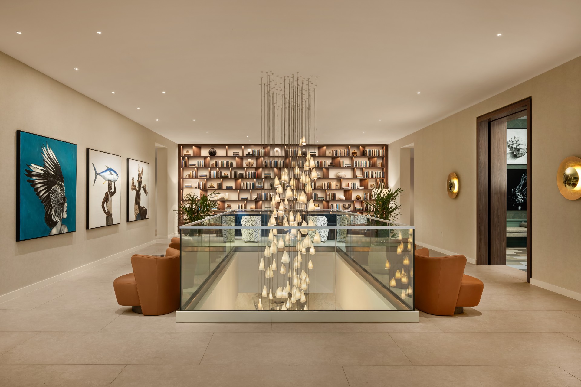 a room with a glass floor and a chandelier