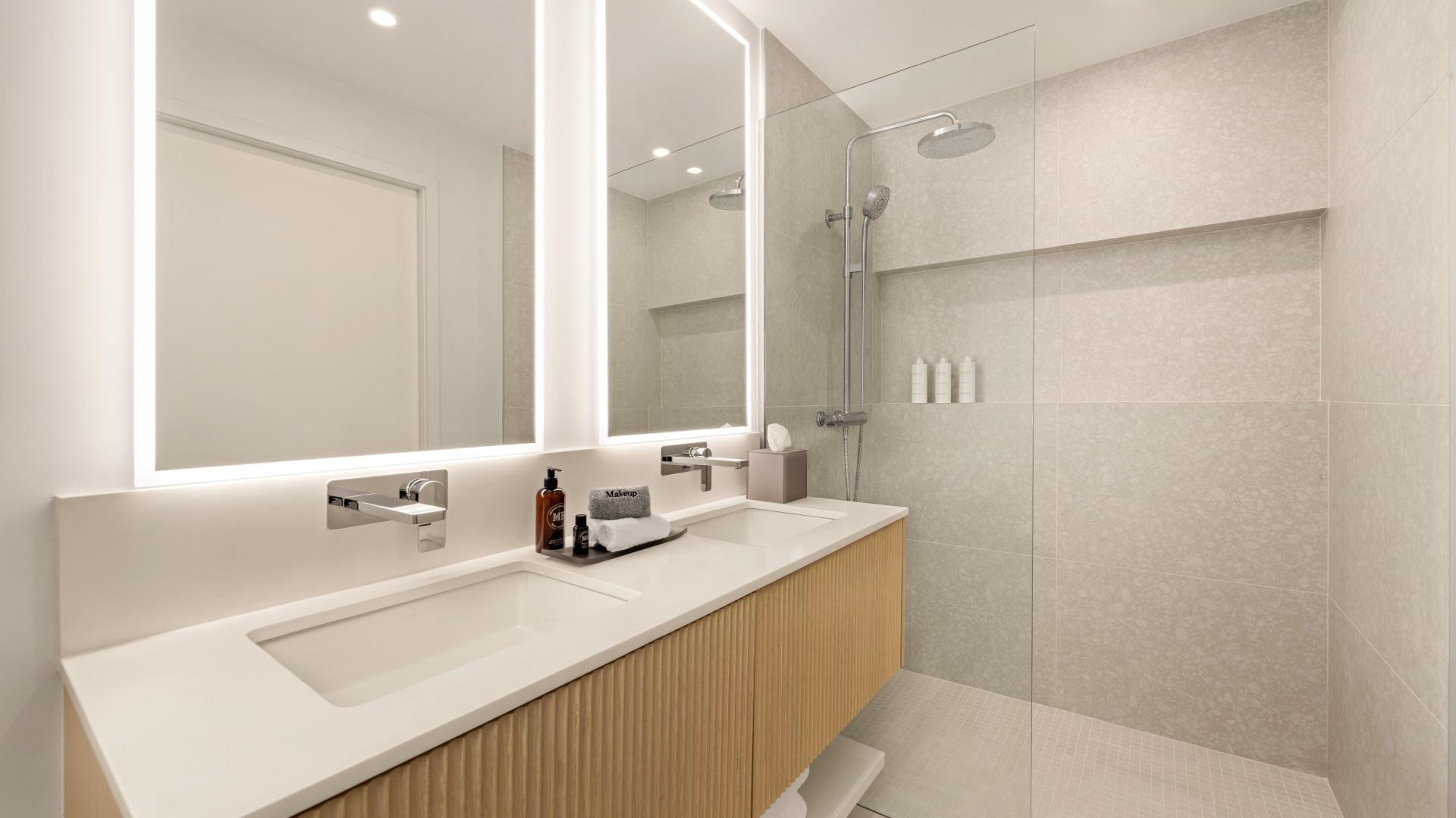 a bathroom with a shower and sink